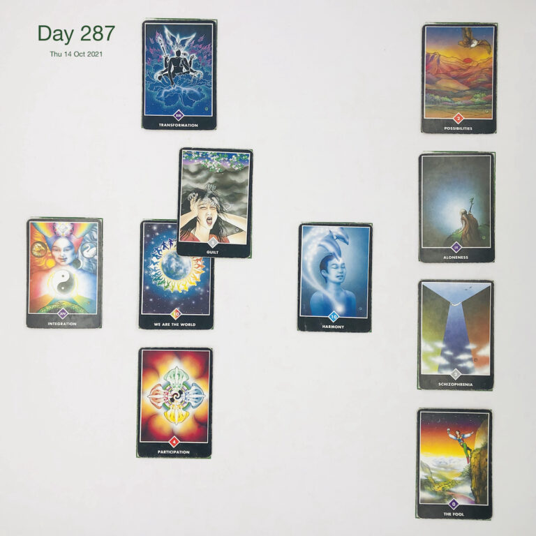 Day 287. Yoga Headache. Cards in order of appearance: We are the World, Guilt, Transformation, Harmony, Participation, Integration, The Fool, Schizophrenia, Aloneness, Possibilities, Deck pile shuffle